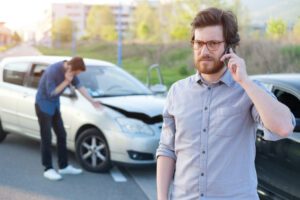Man calls lawyer at crash scene to find out what he should do after a Wisconsin car accident.