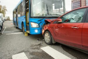 A bus crashed head-on into a car, leaving the car driver to wonder about how to file a claim after a bus accident.