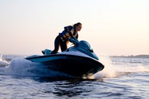 Person riding a jet ski and uncertain about what they would need to do to file a claim after a jet ski accident