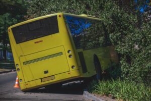 A yellow bus sits in a ditch after a serious bus accident in Wisconsin.
